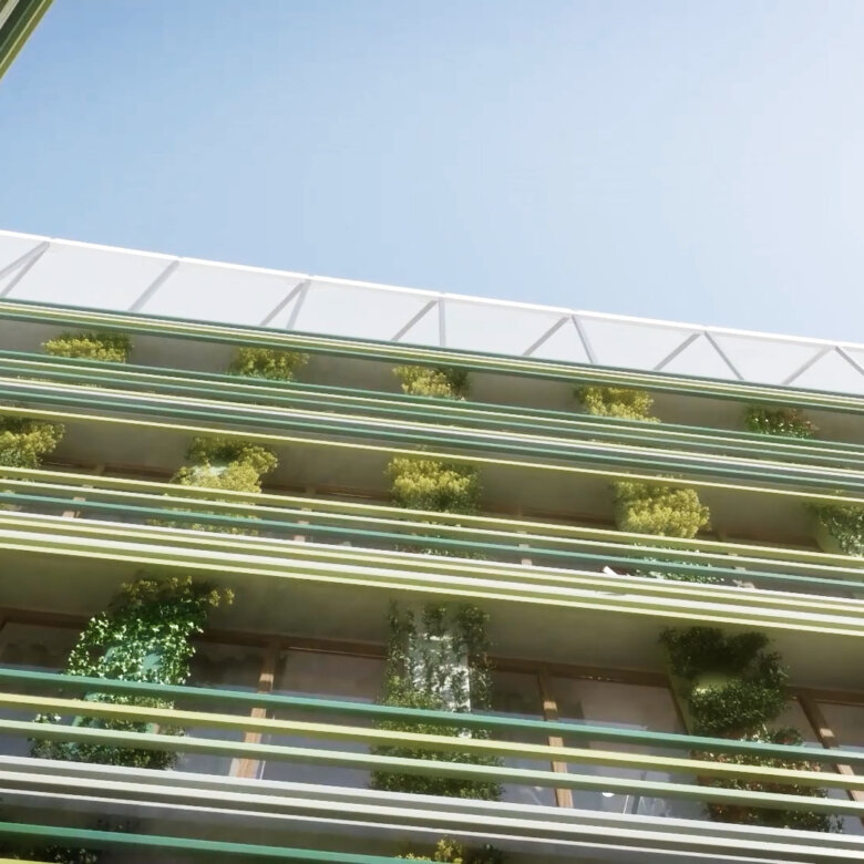 Green railings and plants on a building viewed from below. Blue sky and sun.