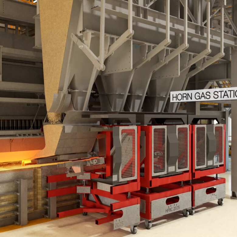 Industrial warehouse with a big glass melting furnace. Red, orange and yellow colors show the temperature states of the melting process.