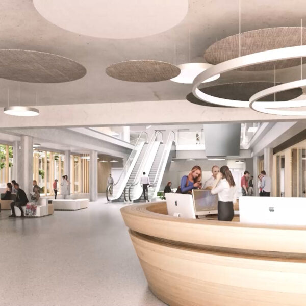 Entrance hall of a modern hospital with help desk, 
