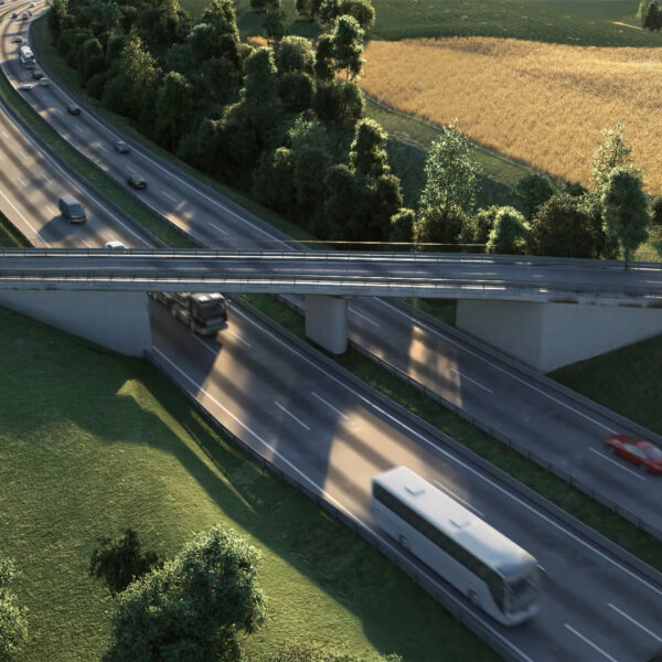 Bridge over motorway beetween on sunny with cars, bus, trucks driving fast.