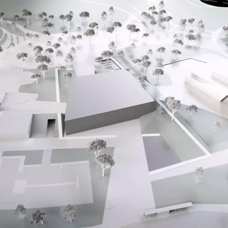 White-greyish architectural computer generated scene with buildings, trees and infrastructure.