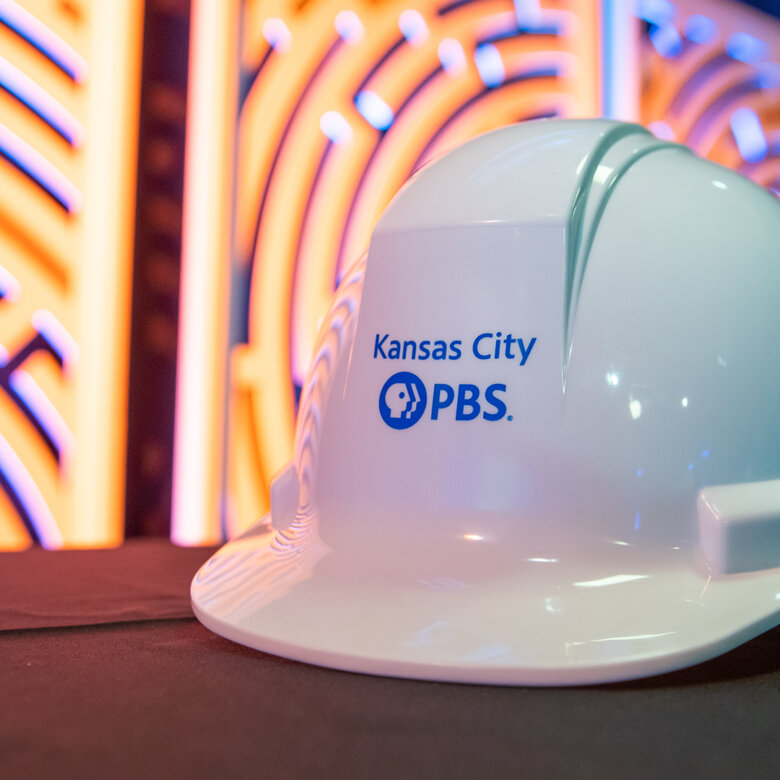 White construction helmet with the imprint Kansas City PBS.
