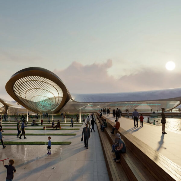 People walking on a promenade with a futuristic building in the background, evening.